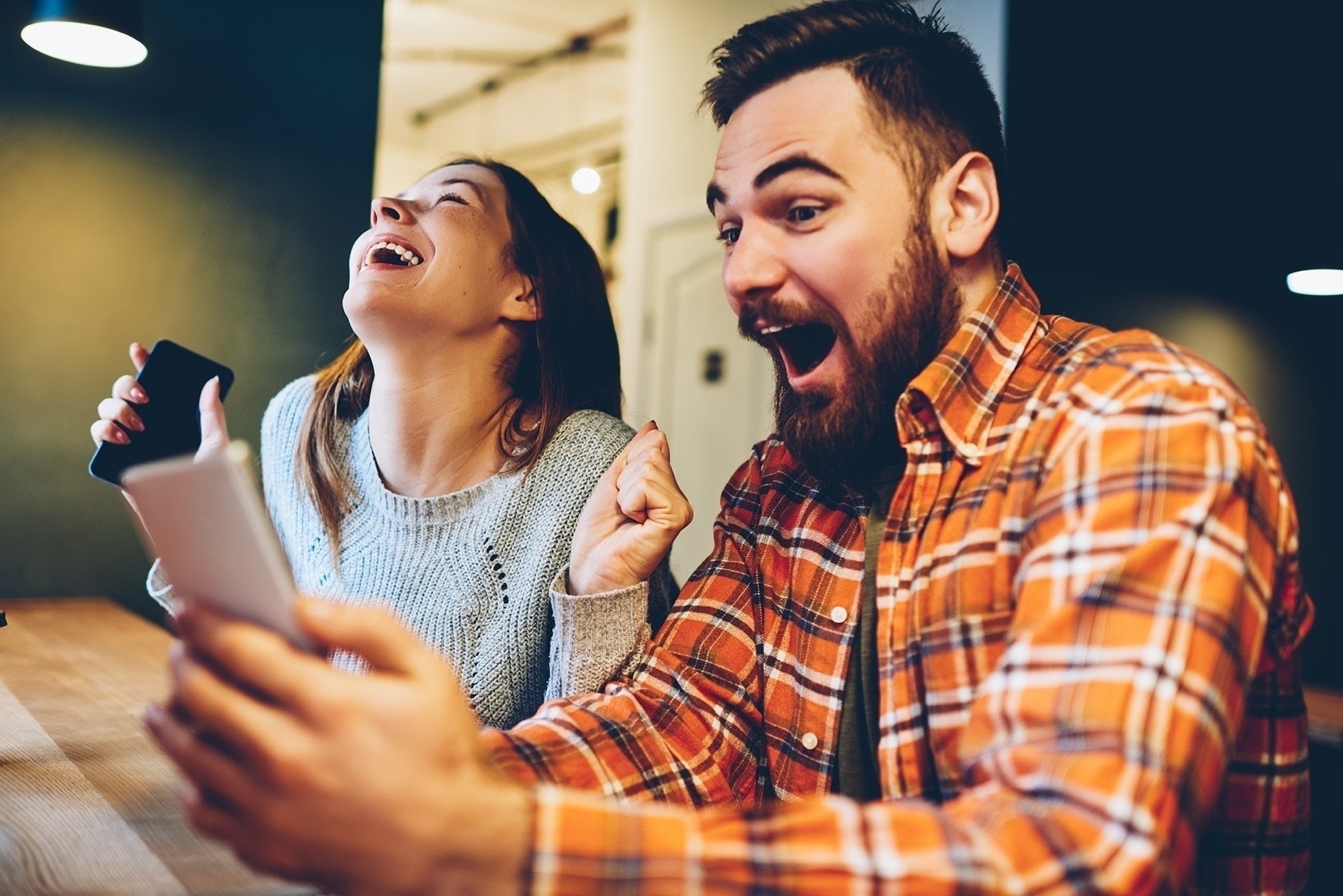 two people laughing together